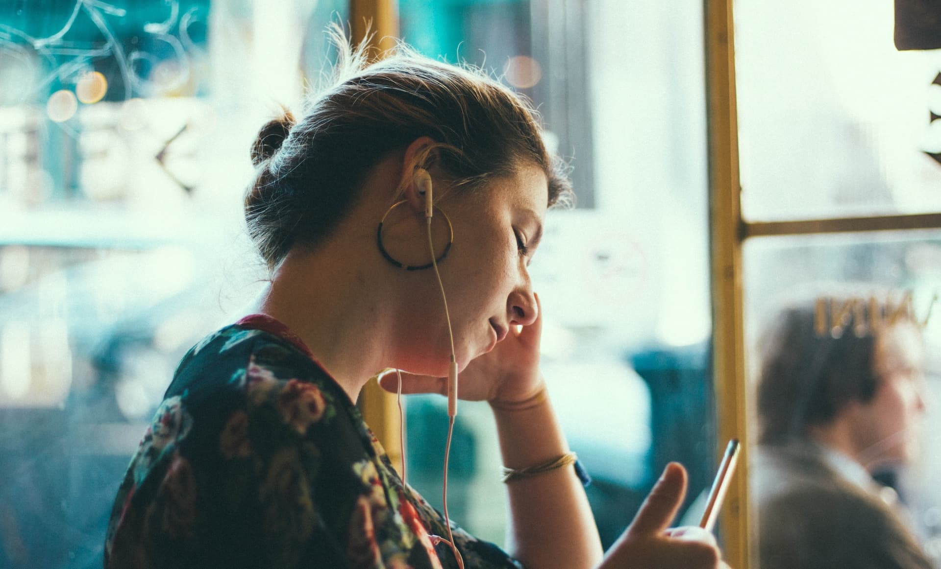 girl listening to headphones