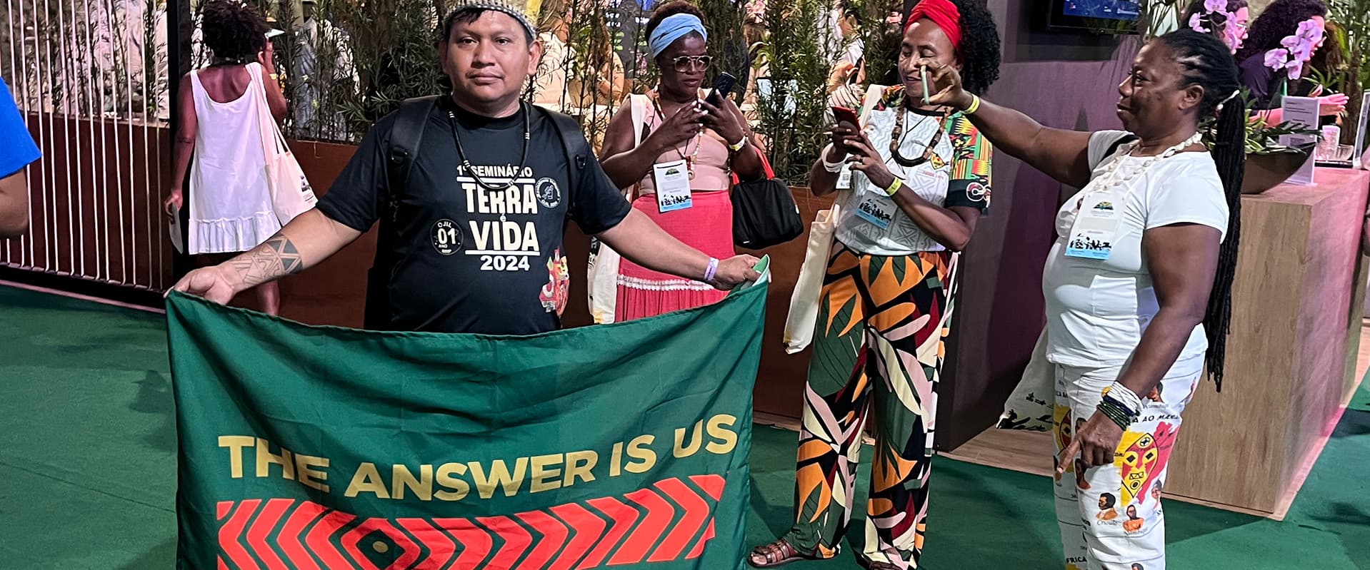 The Answer is Us sign at COP30