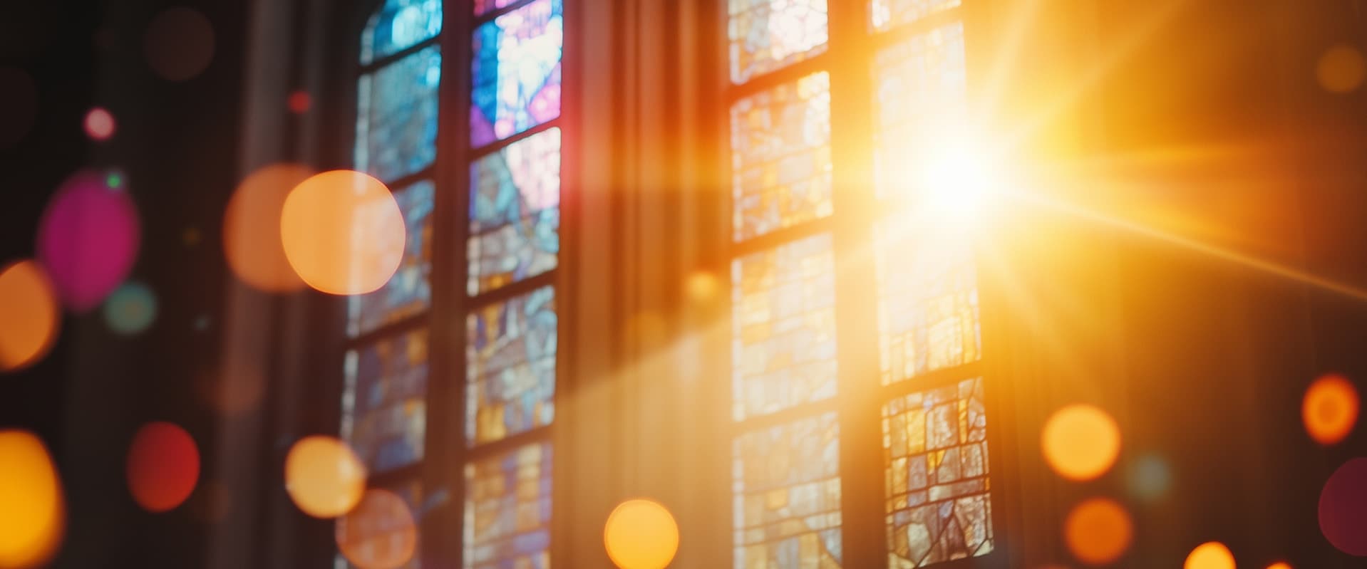 Yellow light coming through stained glass window