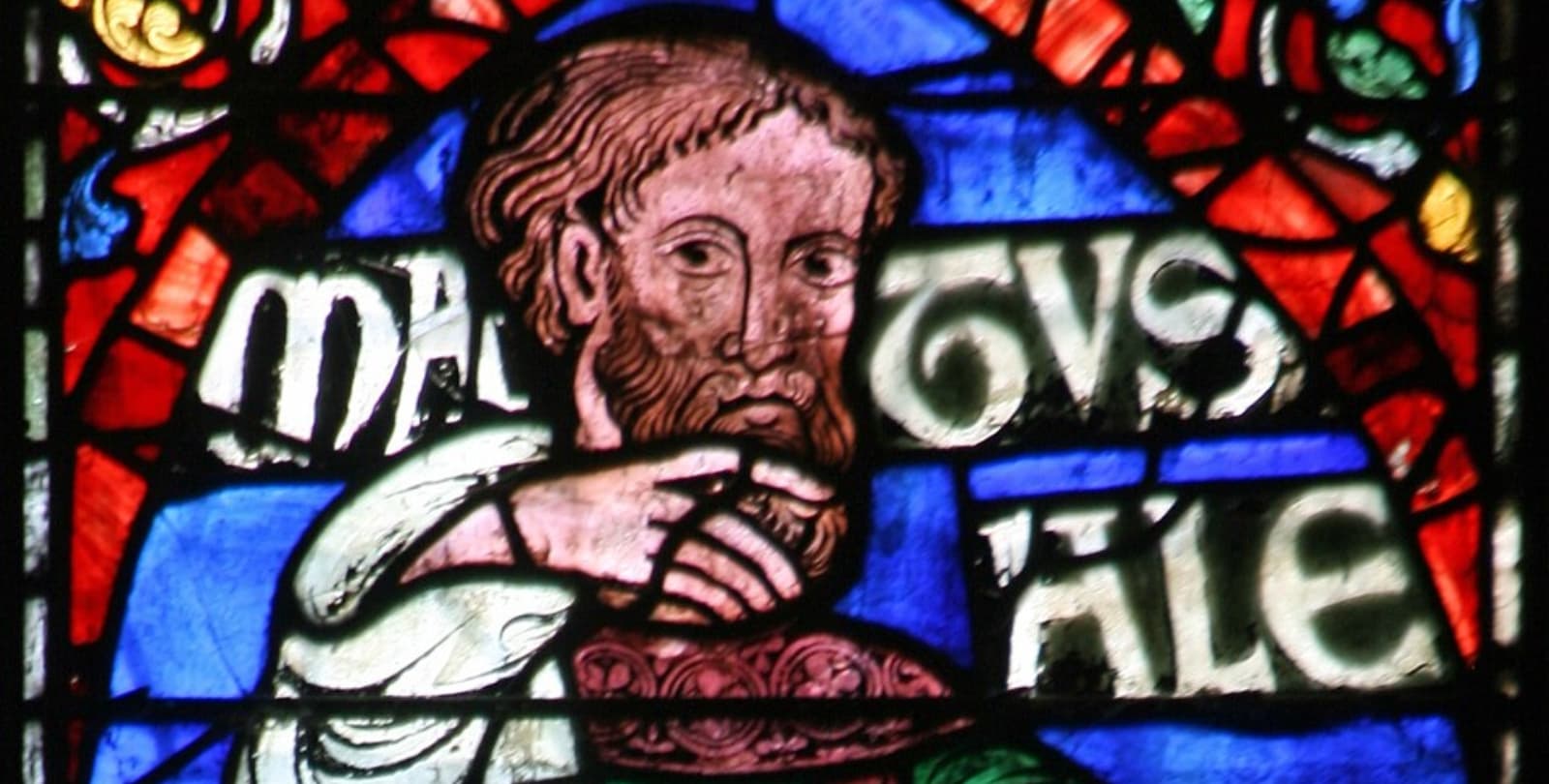 Stained glass visage of Methuselah's face.