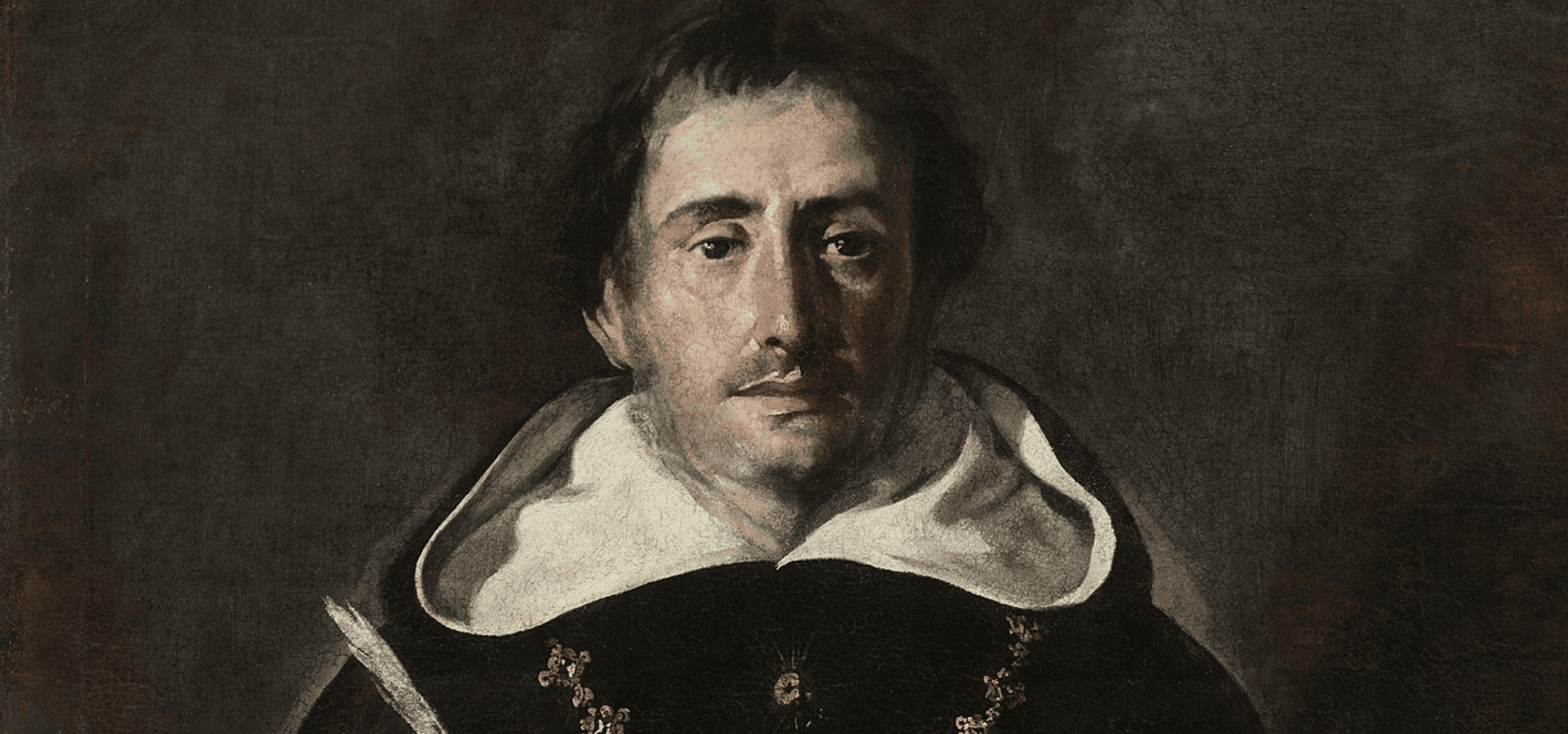 Portrait of Thomas Aquinas. Aquinas has scraggly brown hair, a thin mustache, and wears a robe.