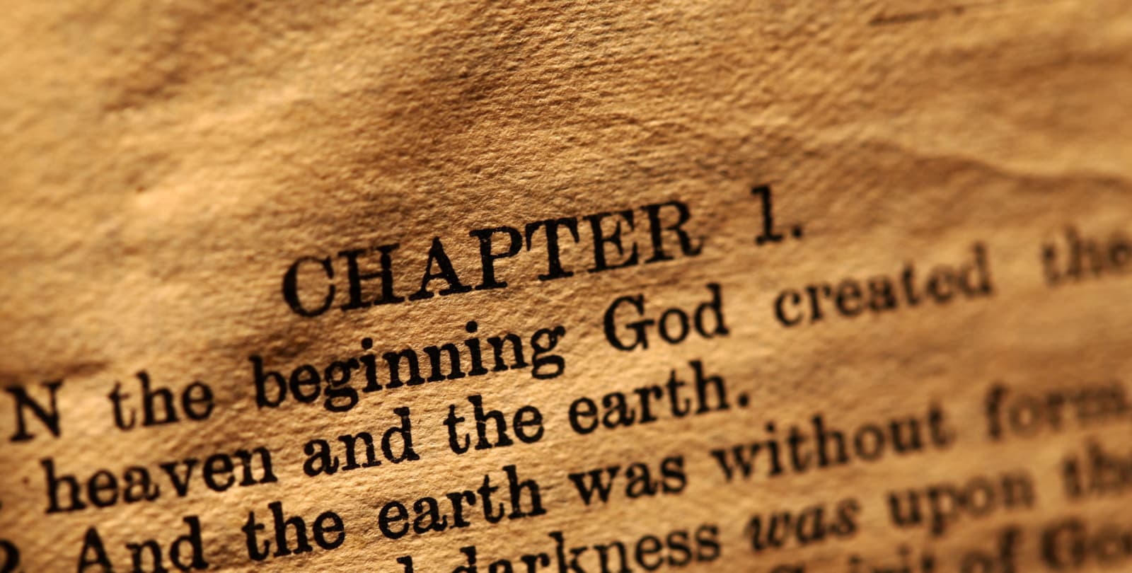 Close-up of the first words of the book of Genesis.